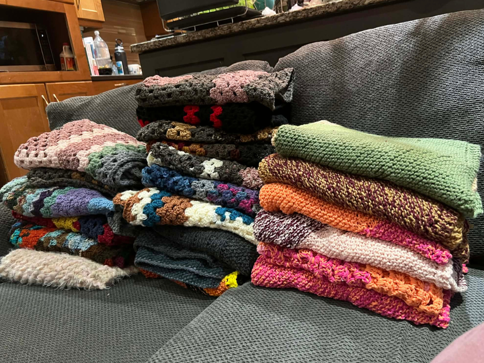 A stack of blankets to be donated to the Winnipeg Humane Society